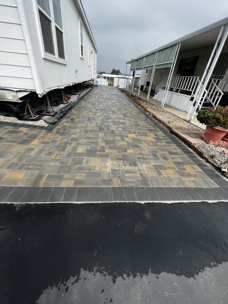 Paver patio and putting green project in Los Angeles County by Evergreen Landscaping