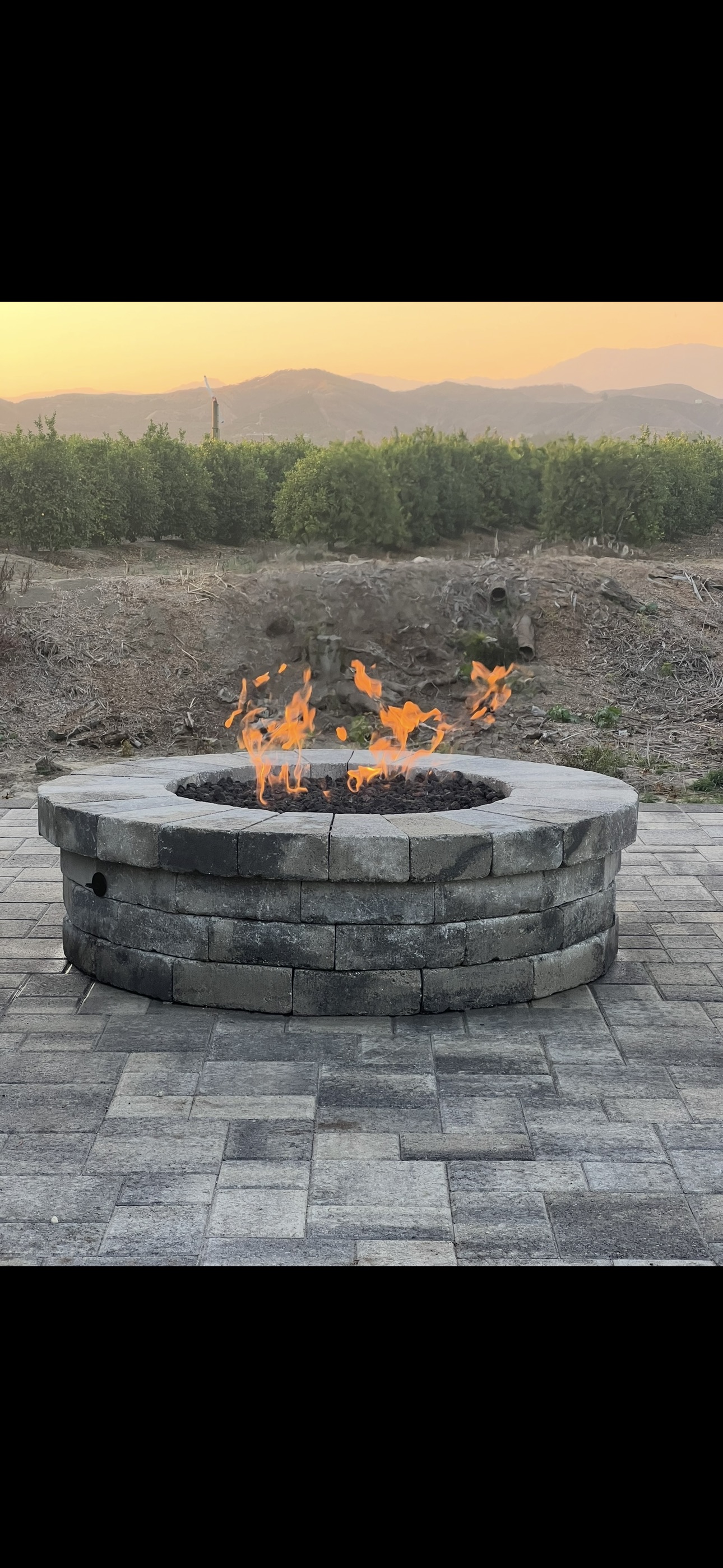 Custom firepit and paver patio project in Camarillo by Evergreen Landscaping