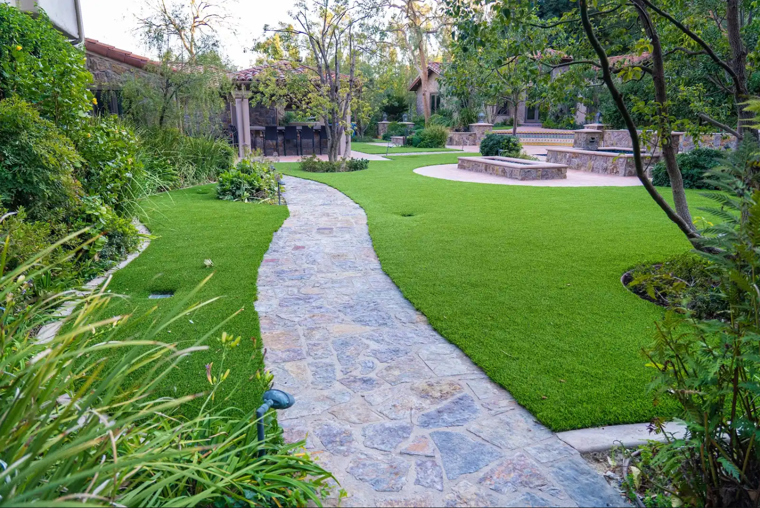 Flagstone path through turf