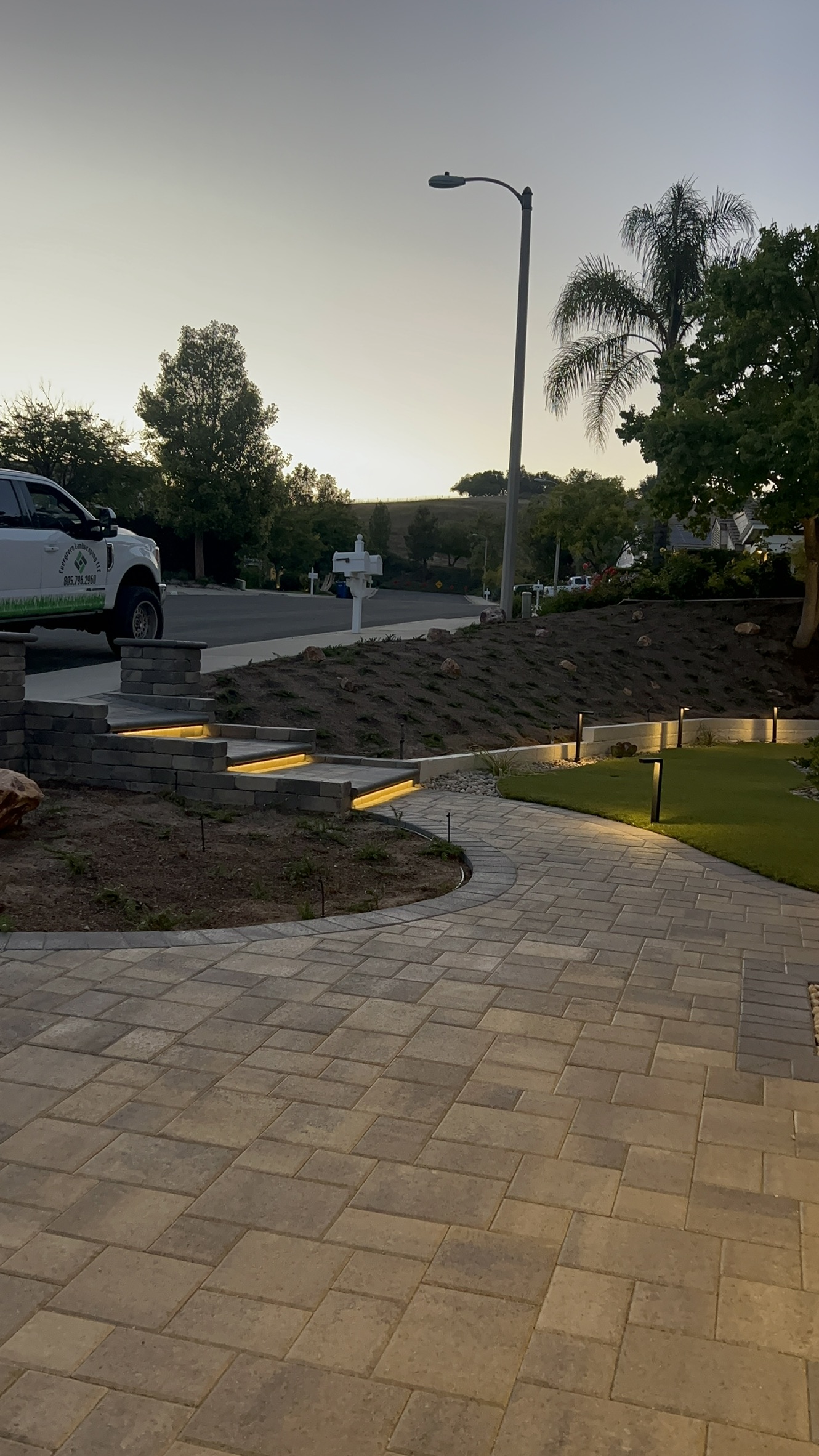Paver patio and putting green project in Los Angeles County by Evergreen Landscaping